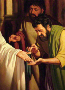 Apostles look at nail pierced hand